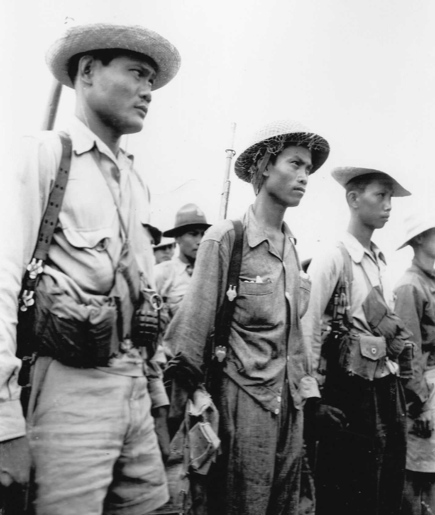 Filipino veterans pose for a photograph