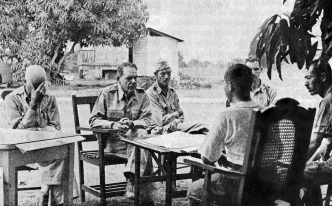 Photo of men negotiating over a table