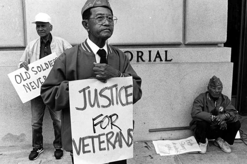 Veterans demonstrate in front of Veterans Memorial Building