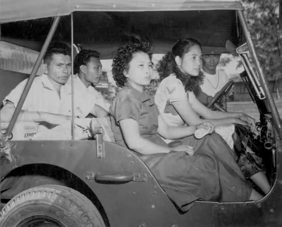 Photo of Filipino guerrillas in a jeep