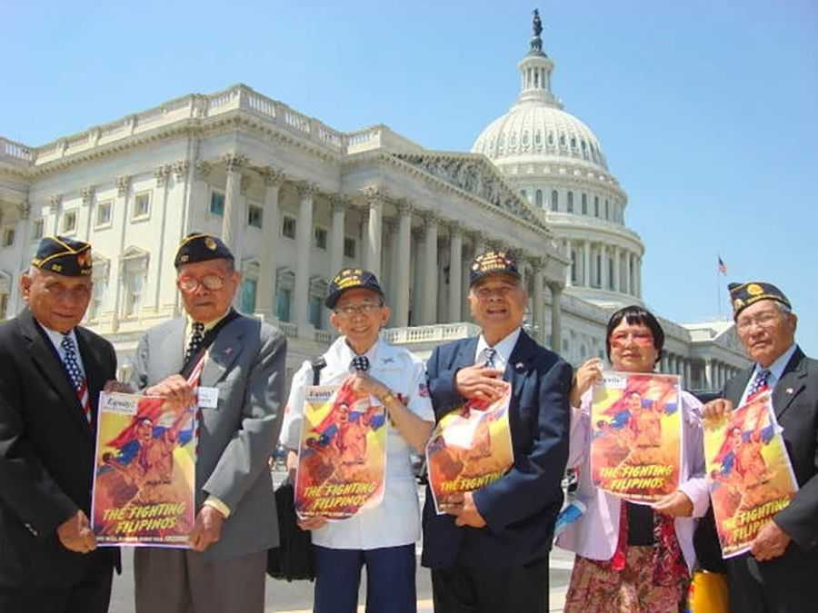 Veterans pose with equity fliers in DC